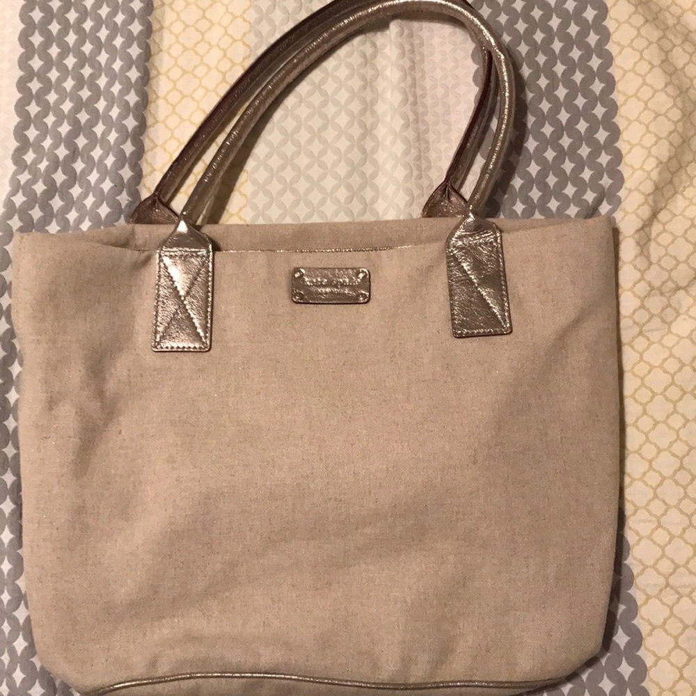 Kate Spade tote! Metallic handles and feet.
